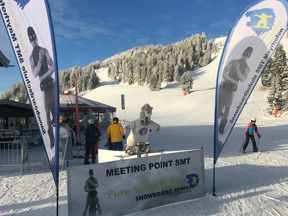 SMT Snowboard School meeting point at the snowboarding lion at the Pilzbar